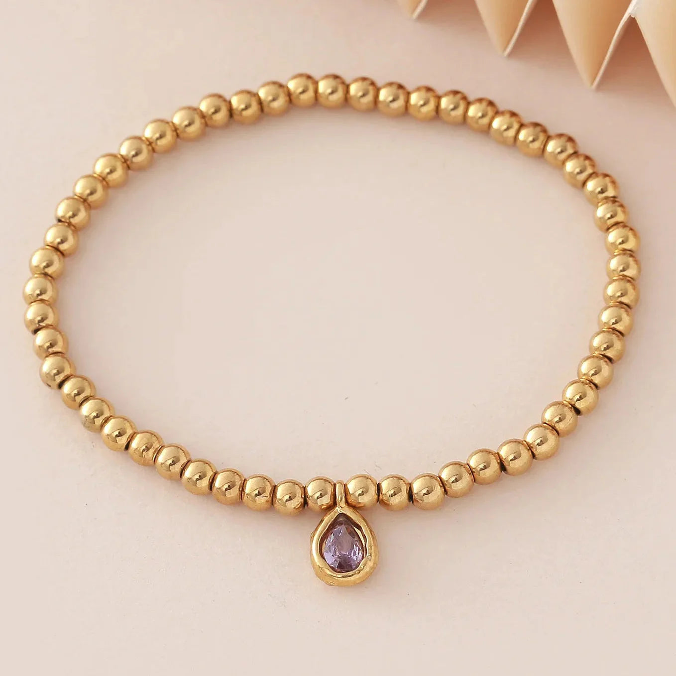 Gold bracelet with birthstone for women