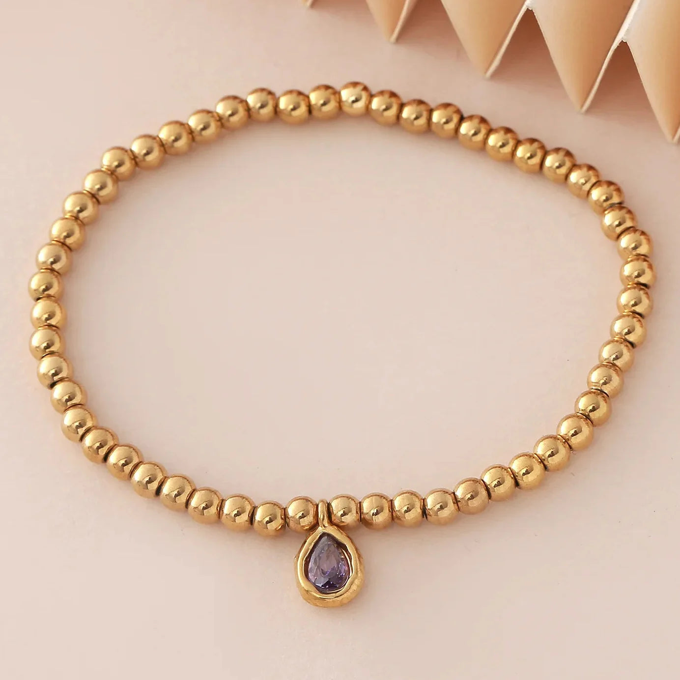 Gold bracelet with birthstone for women