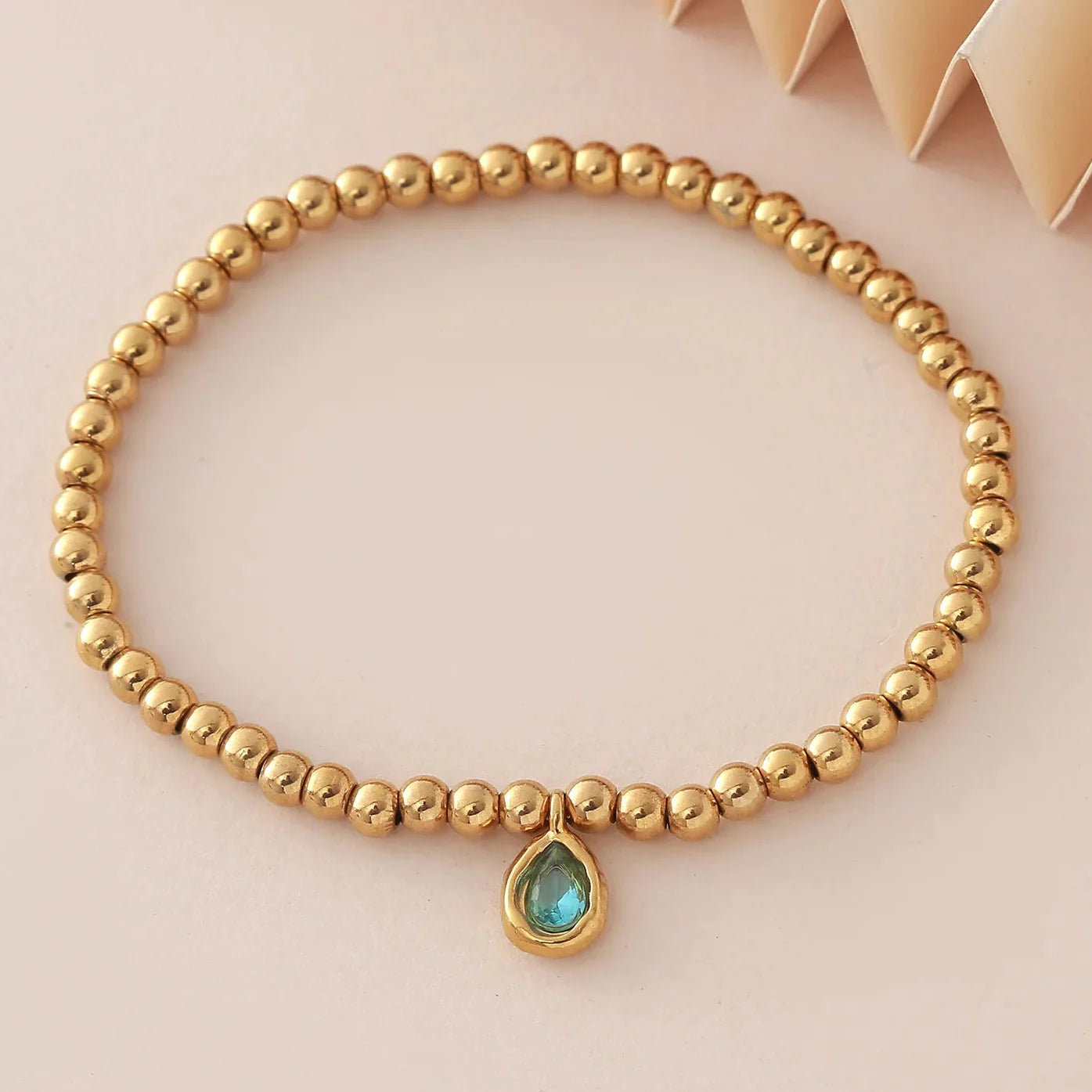 Gold bracelet with birthstone for women