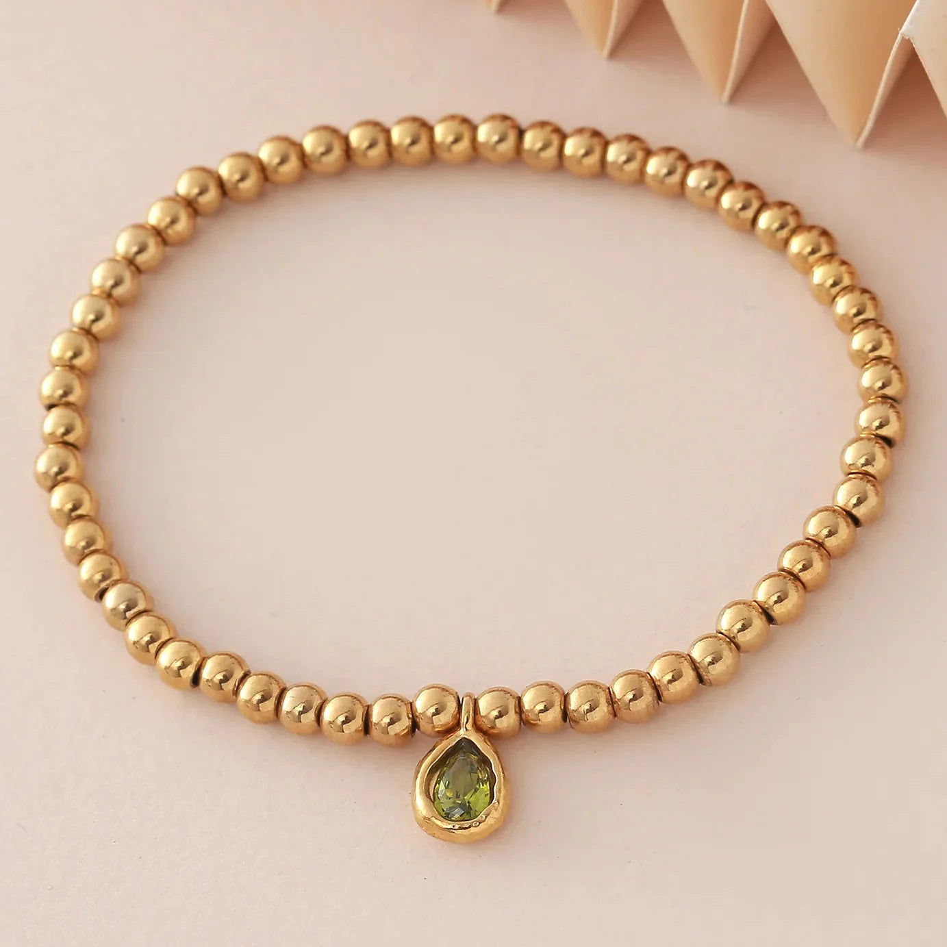 Gold bracelet with birthstone for women