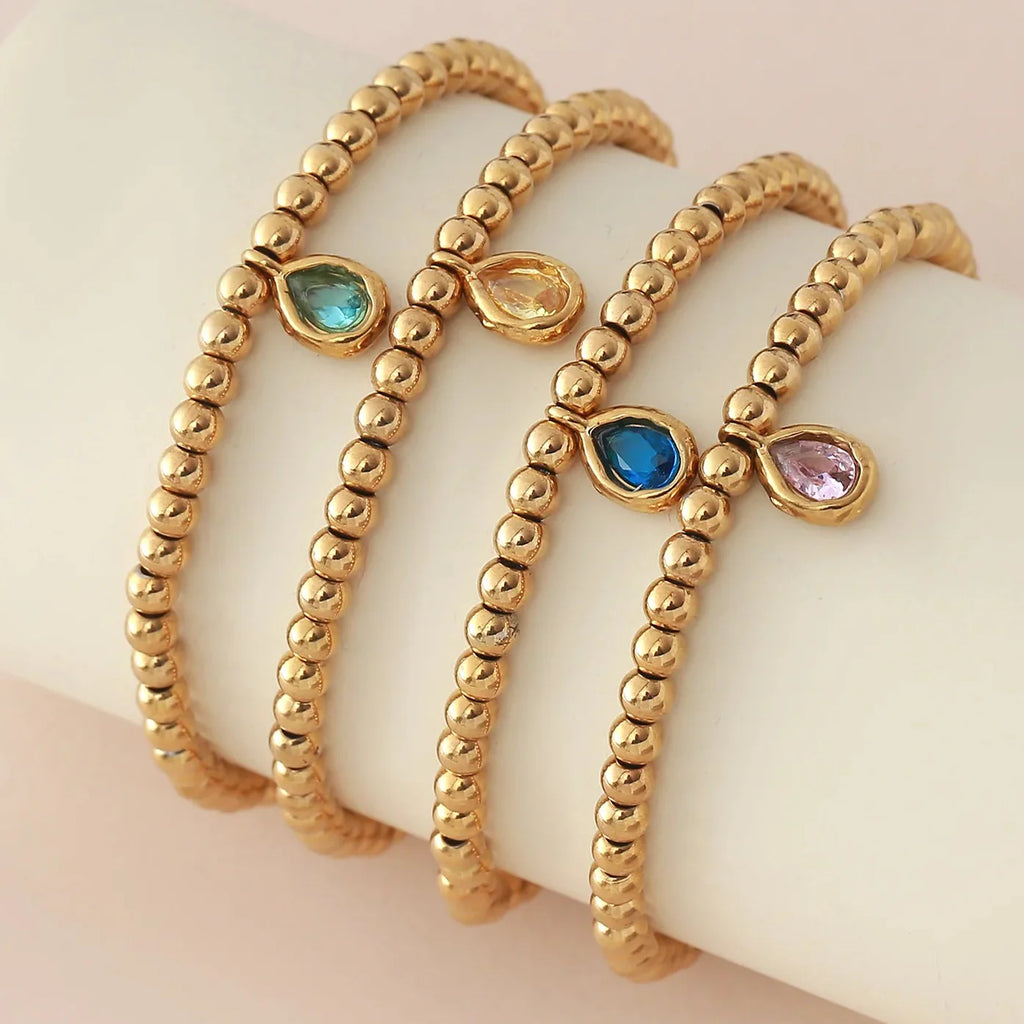 Gold bracelet with birthstone for women