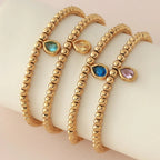 Gold bracelet with birthstone for women