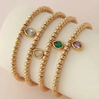 Gold bracelet with birthstone for women