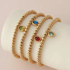 Gold bracelet with birthstone for women