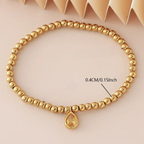 Gold bracelet with birthstone for women