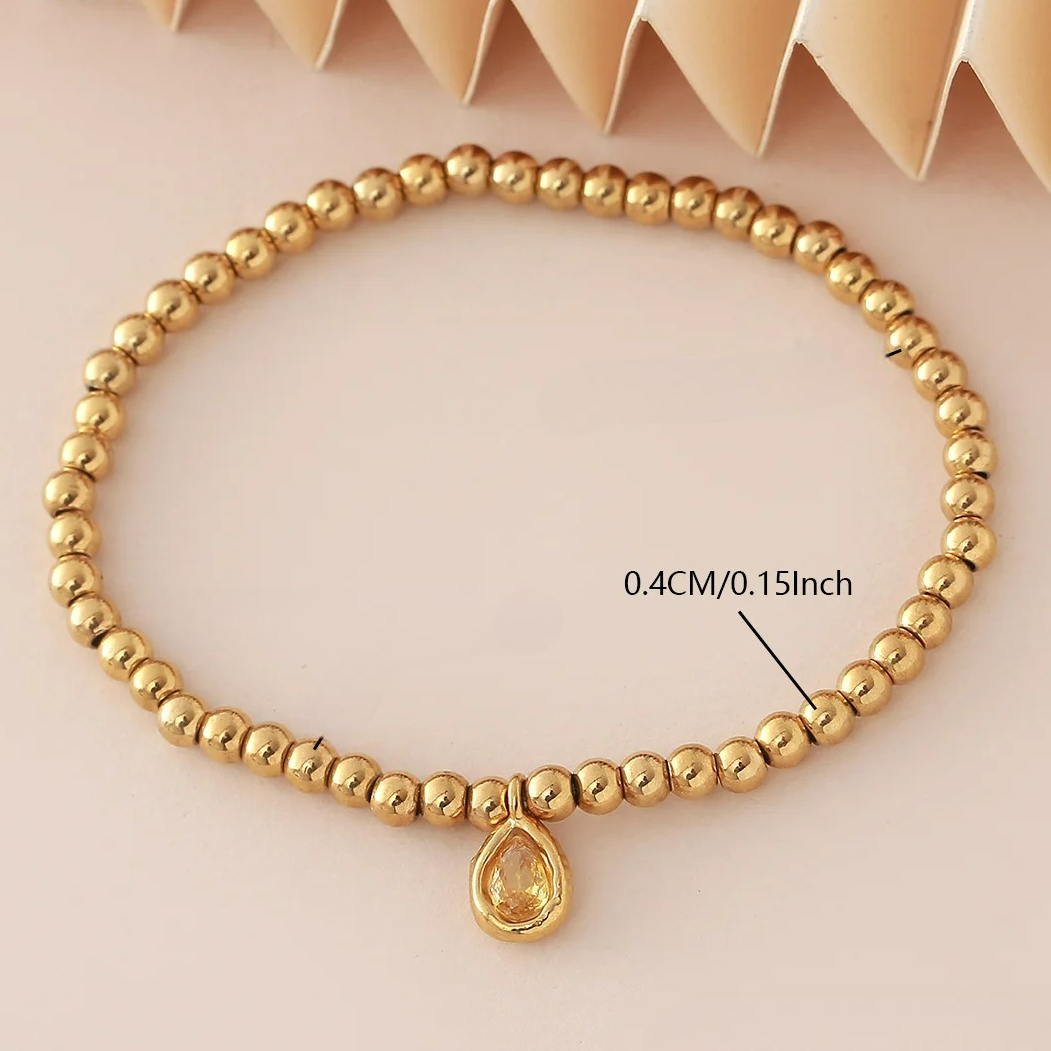 Gold bracelet with birthstone for women