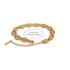 Gold-plated cowrie shell bracelet
