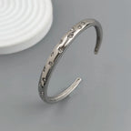 Elegant Bracelet with Silver Stars and Celestial Motifs