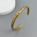 Elegant Bracelet with Gold Stars and Celestial Motifs