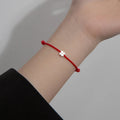 Rope Bracelet with White and Red 4-Leaf Clover