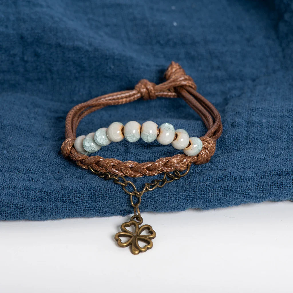 Rope Bracelet with Four-Leaf Clover and Light Blue Beads