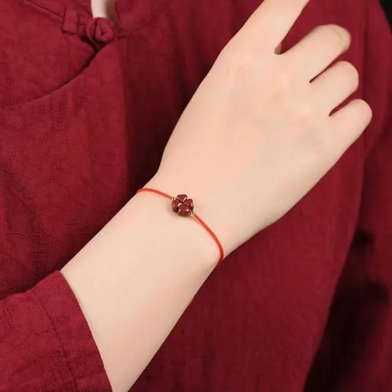 Cord Bracelet with Four-Leaf Clover in Red Cinnabar Stone 