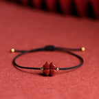 Cord Bracelet with Four-Leaf Clover in Black Cinnabar Stone