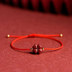 Cord Bracelet with Four-Leaf Clover in Red Cinnabar Stone