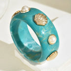 Resin bracelet with green shell