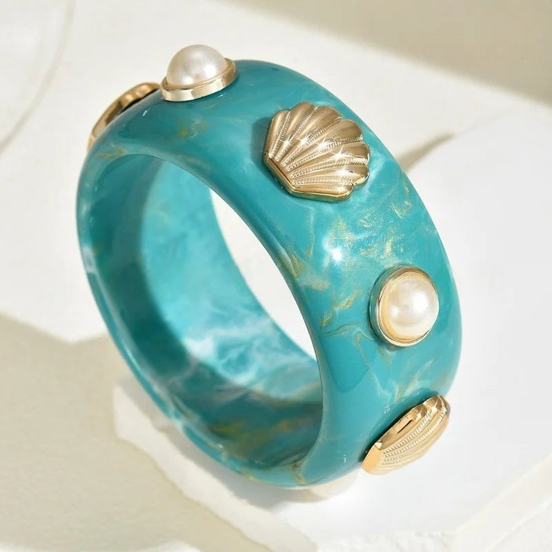 Resin bracelet with green shell