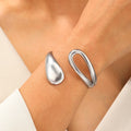 Elegant curb bracelet with silver water drop