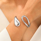 Elegant curb bracelet with silver water drop