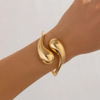 Large Asymmetrical Water Drop Curb Bracelet gold