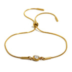 Bangle bracelet with colored birthstone