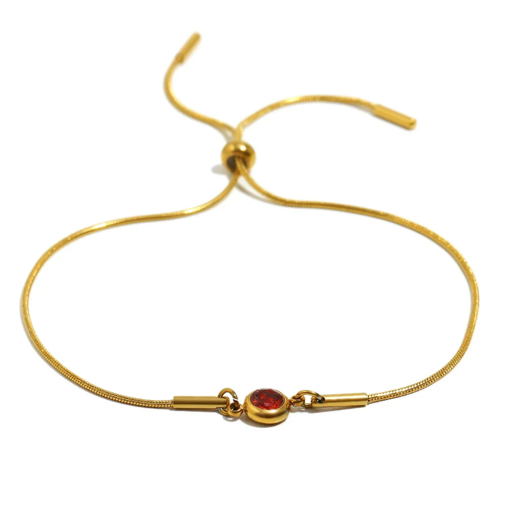 Bangle bracelet with colored birthstone