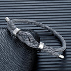 Modern braided rope bracelet with gray knot 
