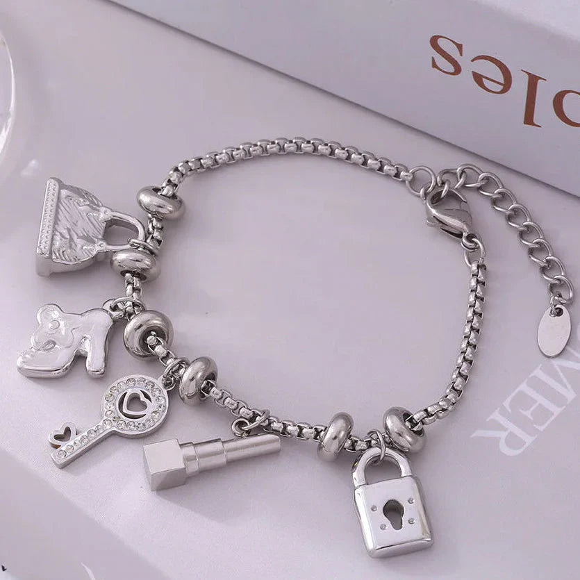 Women's bracelet with silver keys and padlocks
