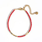 Coral red and gold bracelet