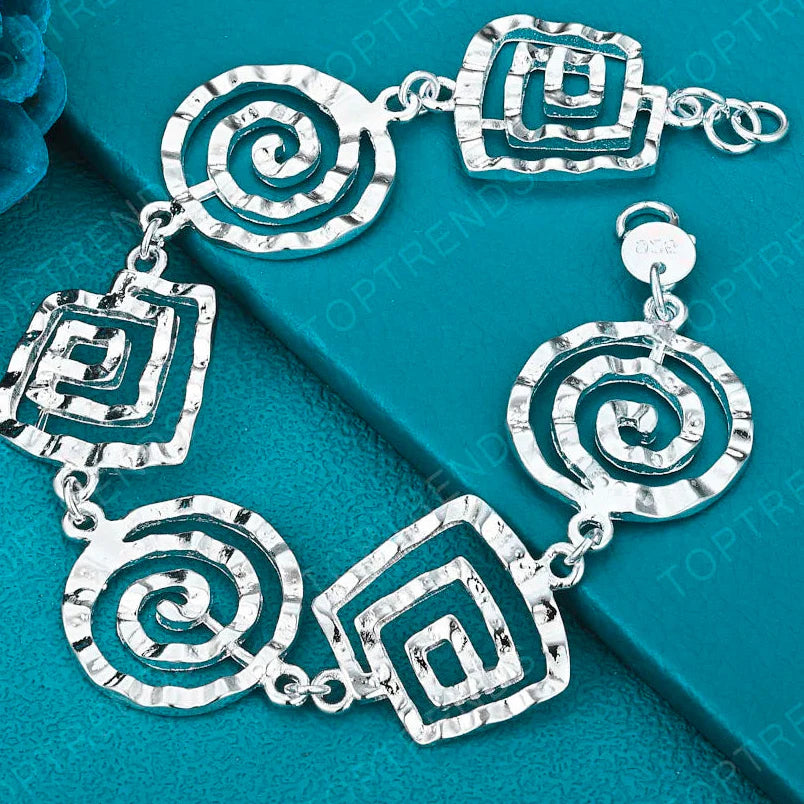 Silver spiral bracelet for women