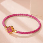 Braided Leather Bracelet with 4-Leaf Clover dark pink