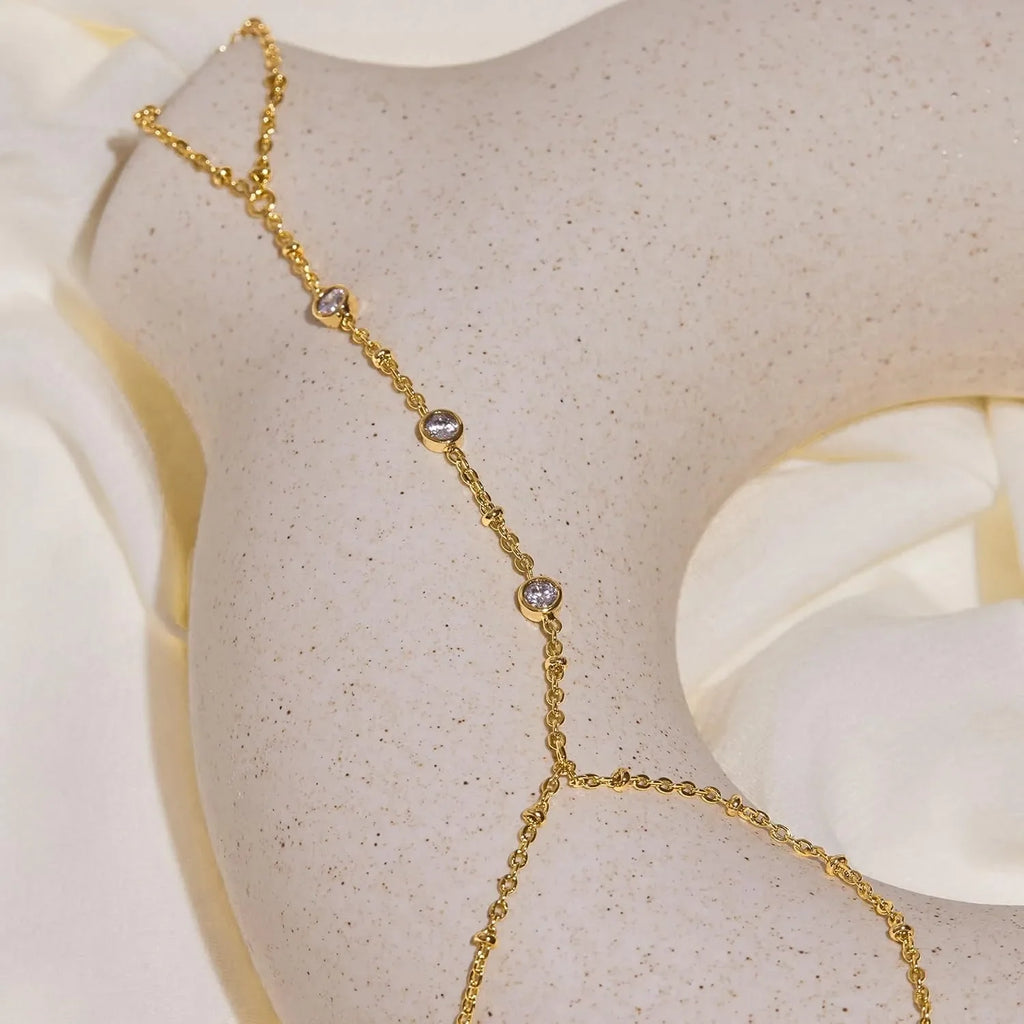 Hand and finger chain with zircons - women's hand bracelet gold