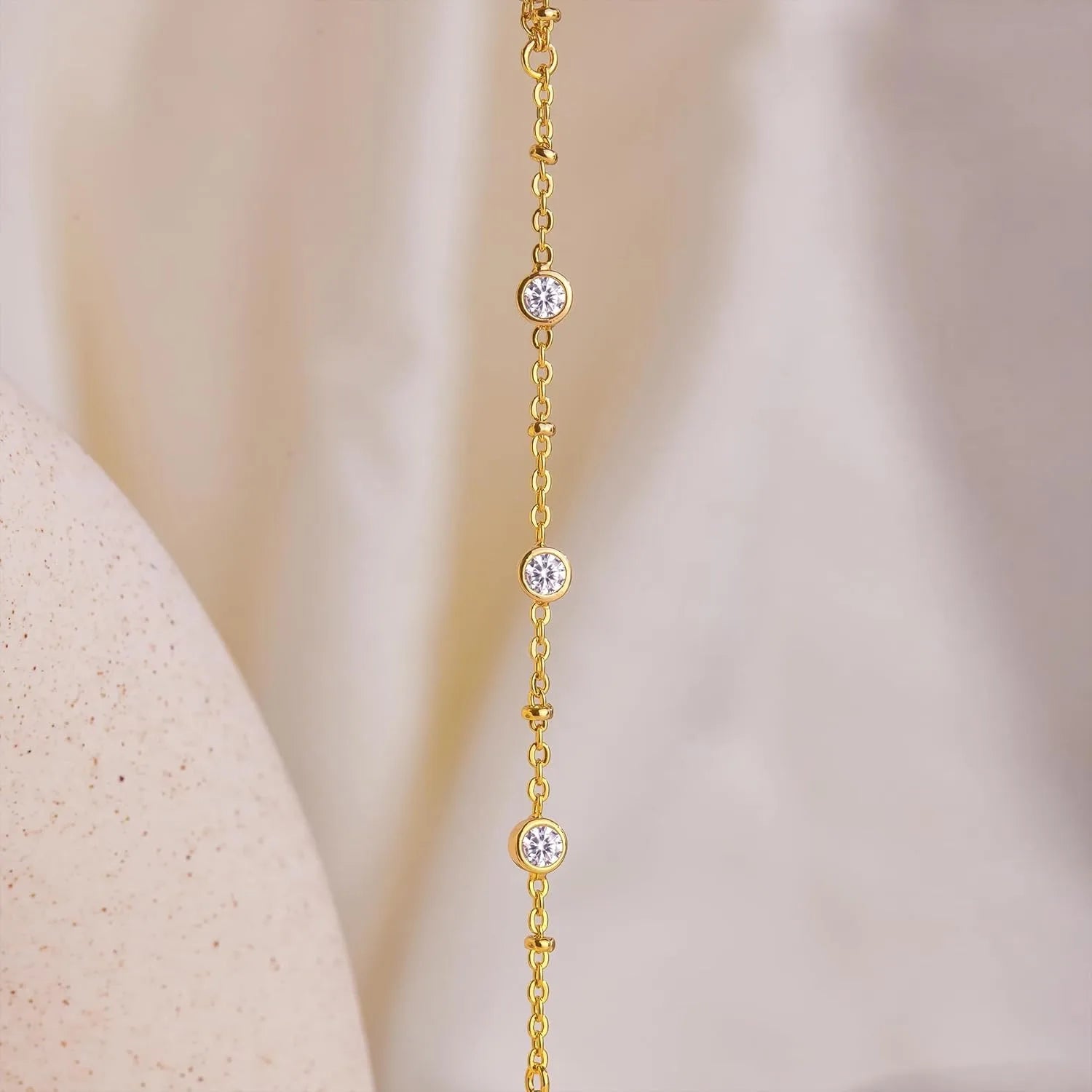 Hand and finger chain with zircons - women's hand bracelet gold