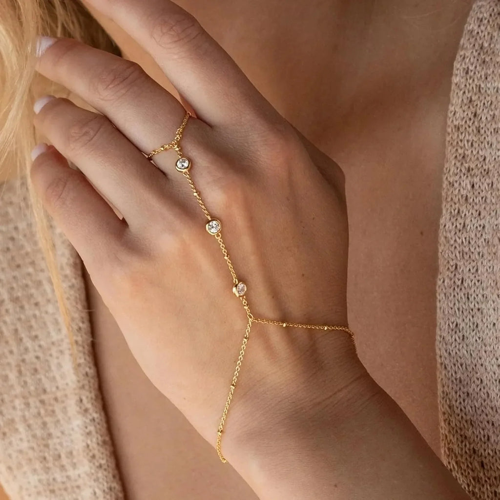 Hand and finger chain with zircons - women's hand bracelet gold