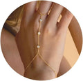 Hand and finger chain with zircons - women's hand bracelet gold