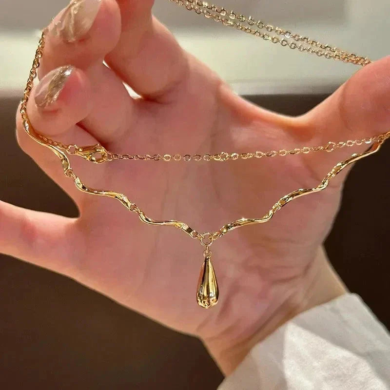 Asymmetrical Necklace with Water Drop Pendant