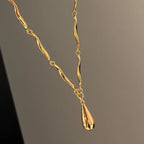 Asymmetrical Necklace with Water Drop Pendant
