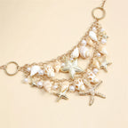 Necklace with large seashell and starfish pendant