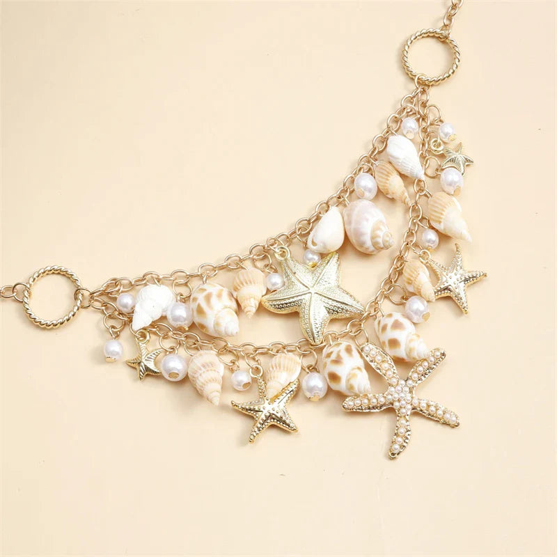 Necklace with large seashell and starfish pendant