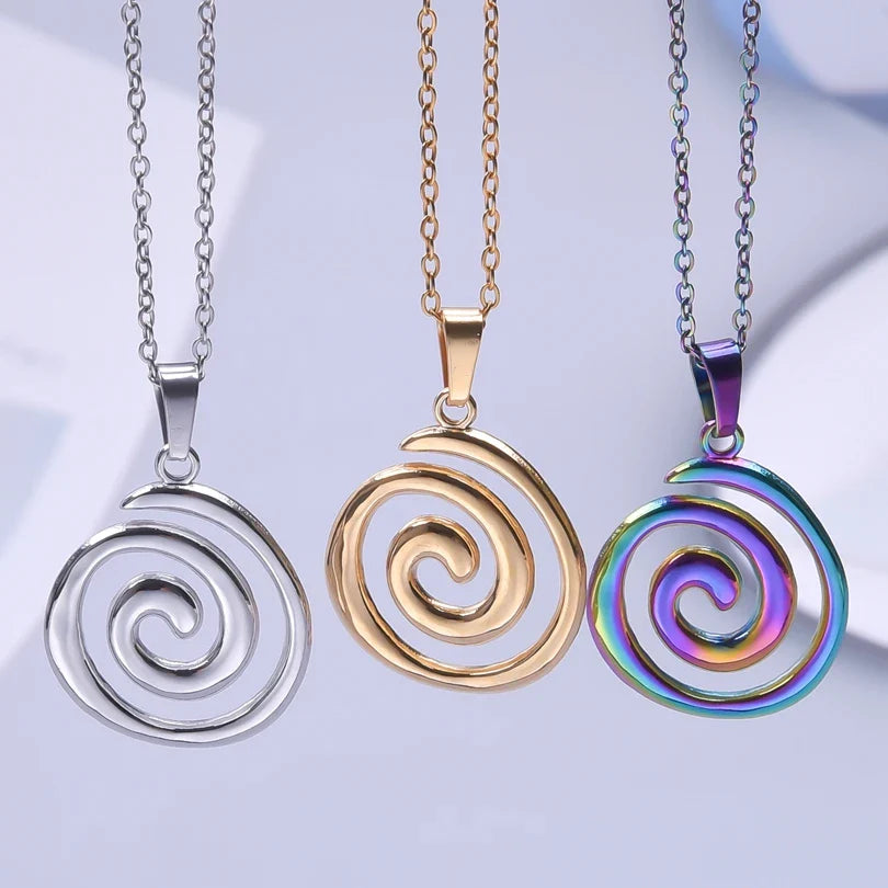 Necklace with large openwork spiral pendant in gold