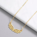 Necklace with large angel wings pendant in gold