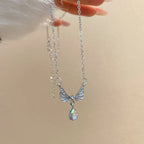 Necklace with angel wing pendant