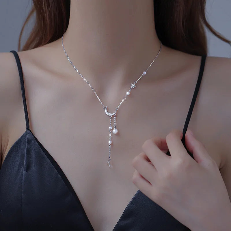 Necklace with Crescent Moon Pendant and Pearls