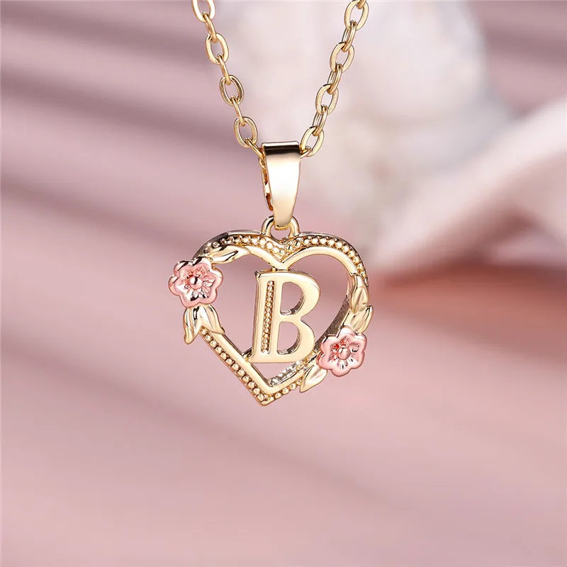 Necklace with heart and flower initial pendant b