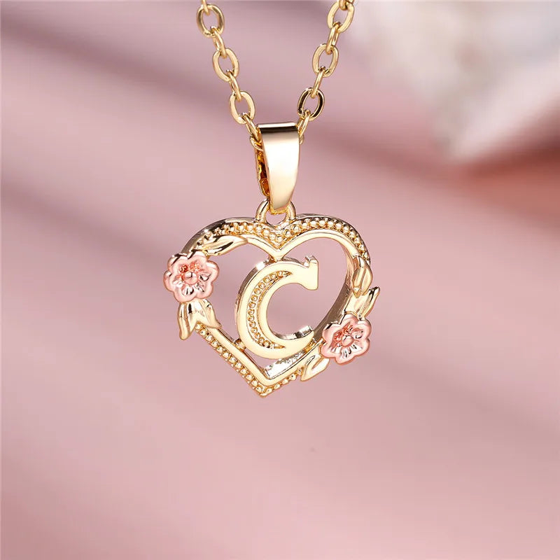 Necklace with heart and flower initial pendant c