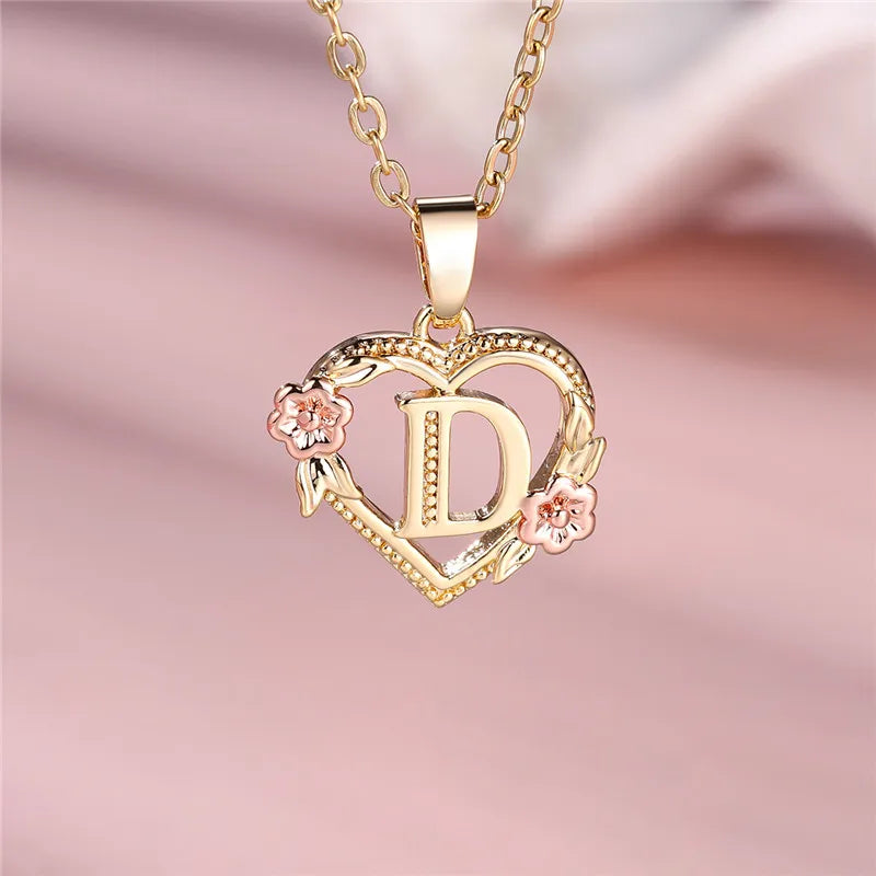 Necklace with heart and flower initial pendant d