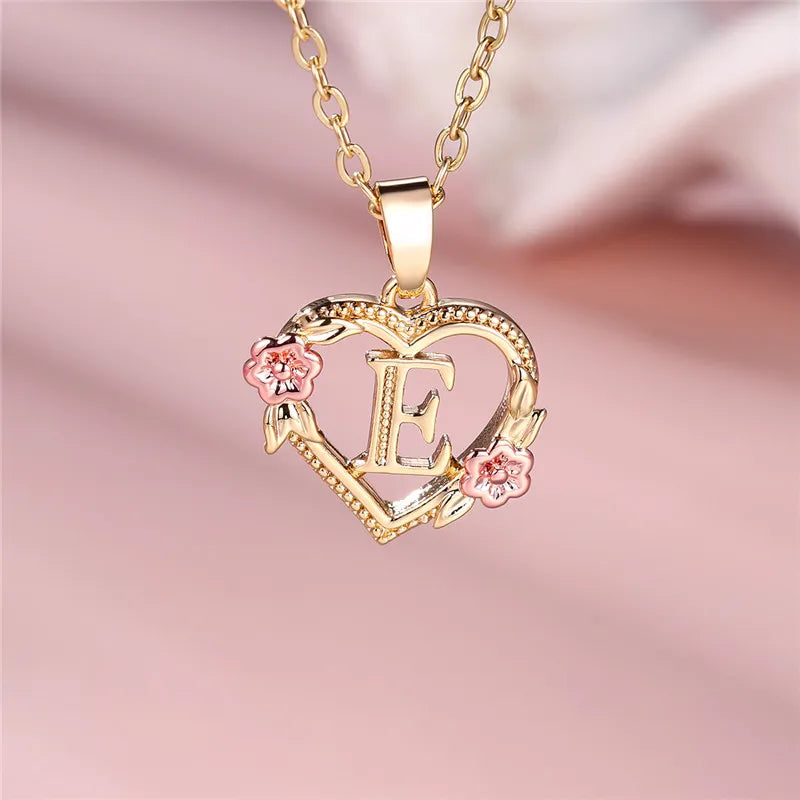 Necklace with heart and flower initial pendant e