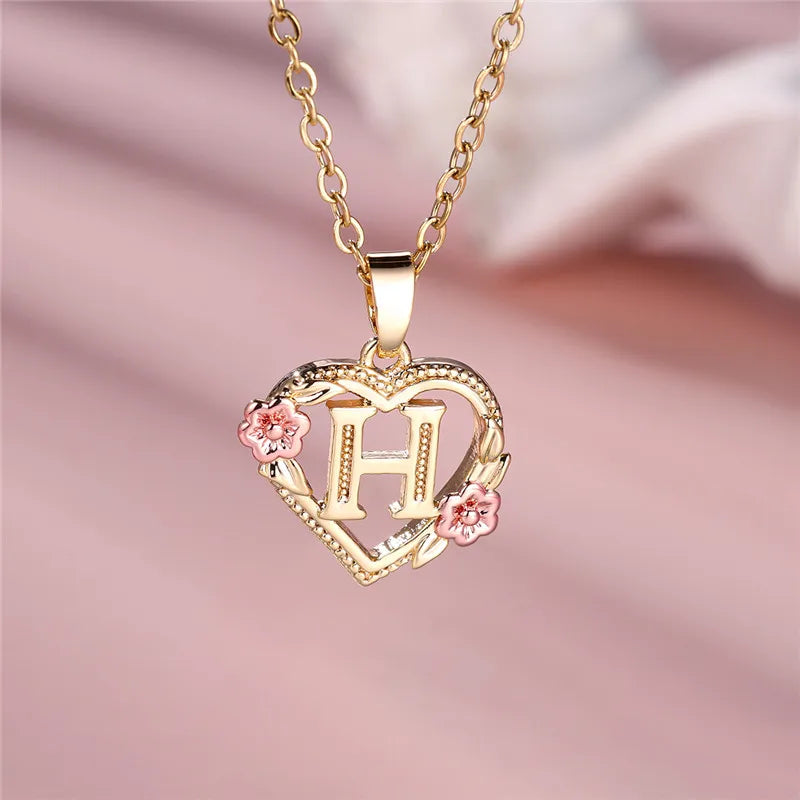 Necklace with heart and flower initial pendant h