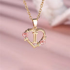 Necklace with heart and flower initial pendant i