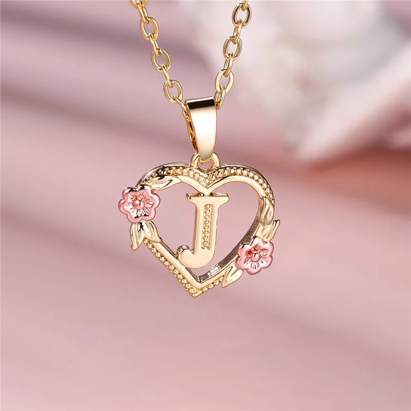 Necklace with heart and flower initial pendant j