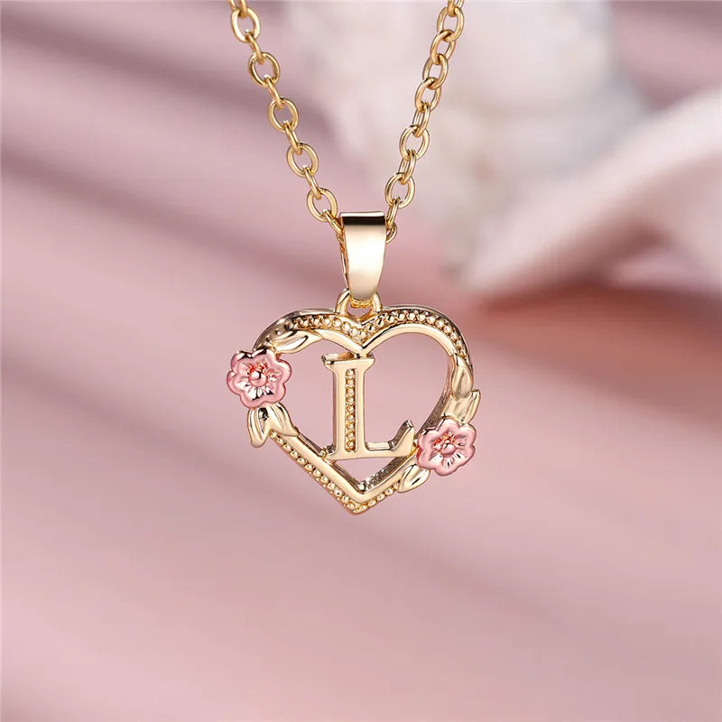 Necklace with heart and flower initial pendant l